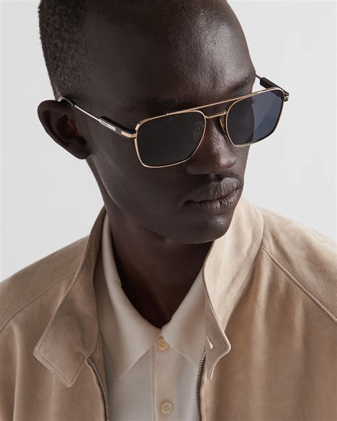 prada spr a04|Sunglasses with iconic metal plaque .